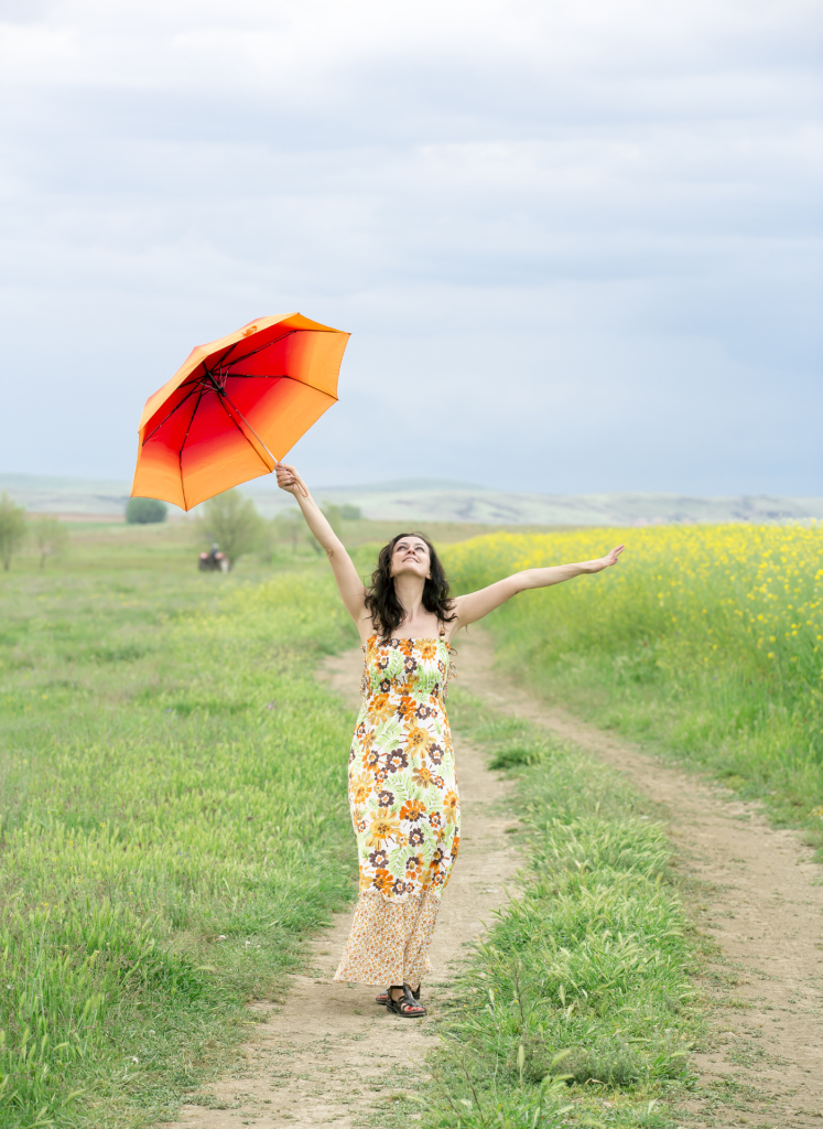 Woman walking a sunny path — take control of your personal finances with free guides and tools from Finance Pro Tips